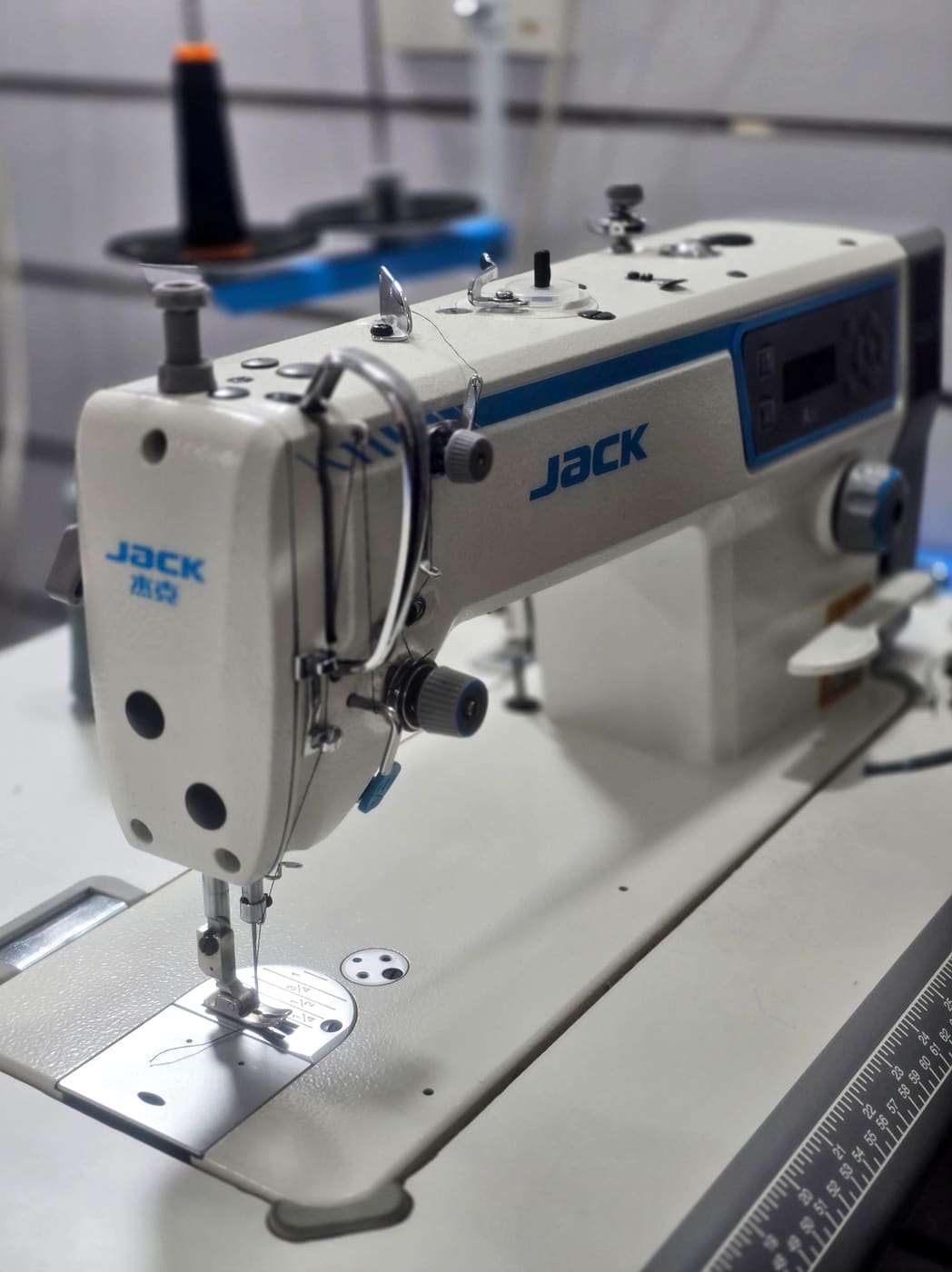 Industrial single-needle lockstitch machine used for hemming and alterations at Younes Tailor